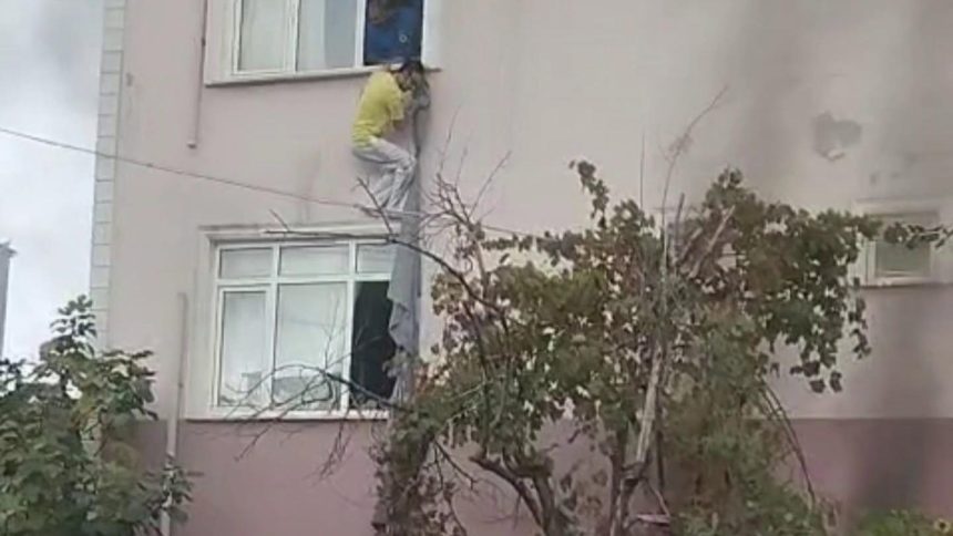 calisanlarin kaldigi binayi atese verdi camdan carsafla kurtuldular EL5YgaIq